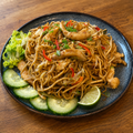 Mì Trứng Xào — Stir-Fried Egg Noodles with Pork, Chicken, or Prawns.